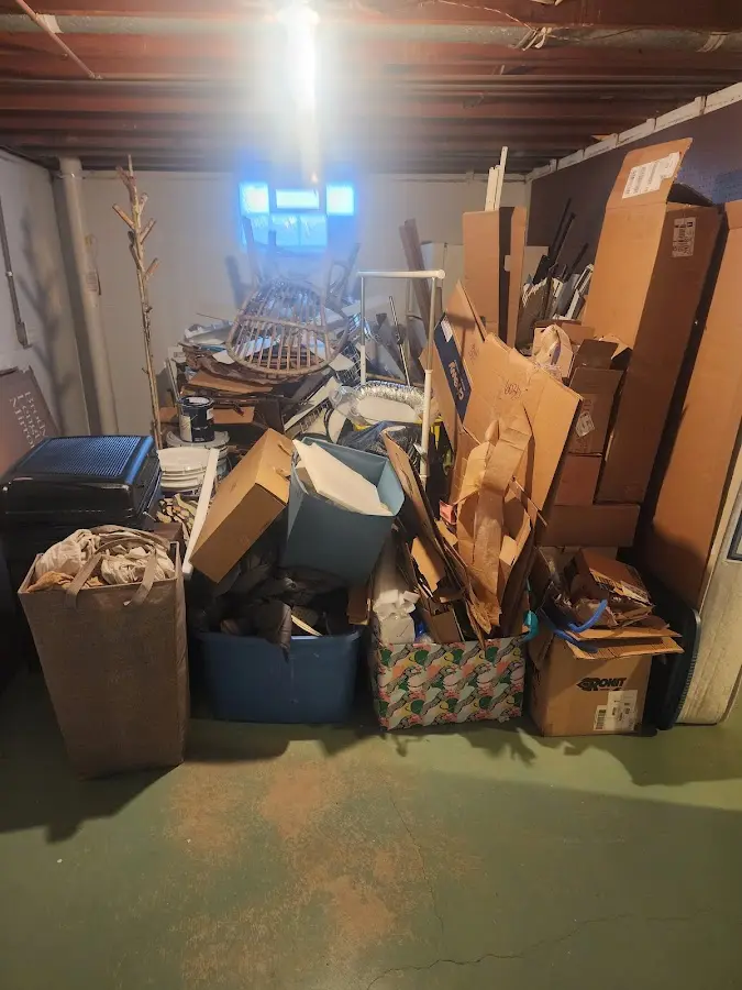 Roll-off dumpster container at job site for Yard Waste Dumpster Rental in Epsom